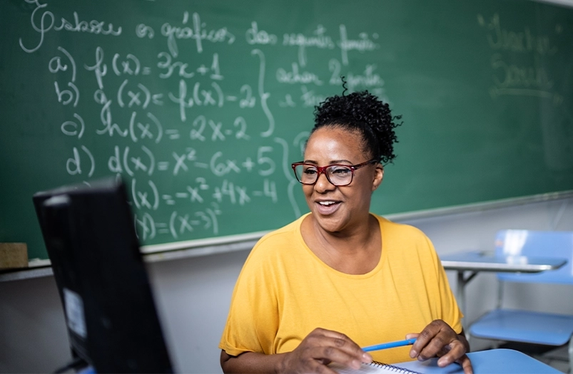 Teacher using a computer